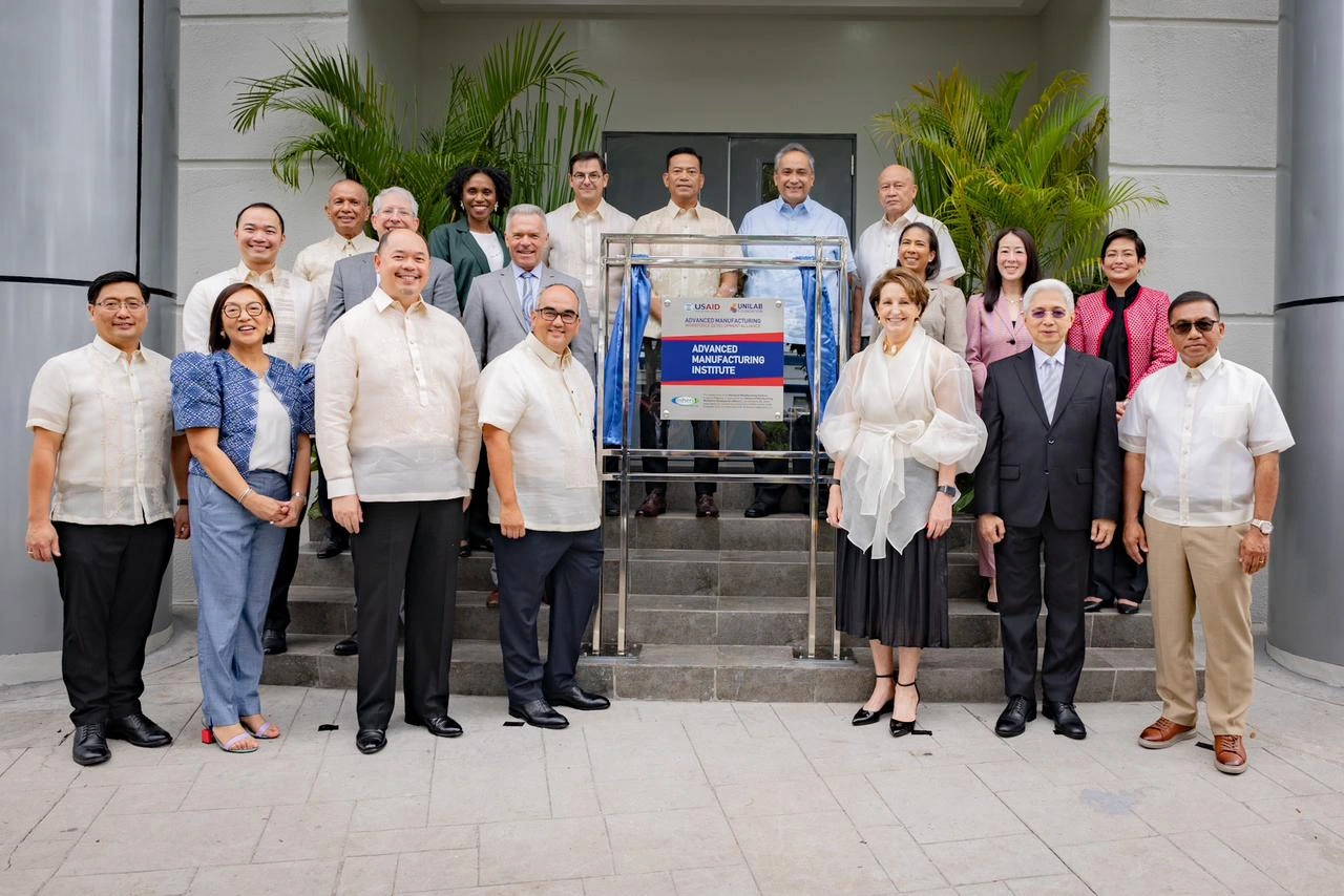U.S. Ambassador MaryKay Carlson (third from right), Trade Secretary Alfredo Pascual (second from right), Science and Technology Secretary Renato Solidum, Jr. (rightmost), and Group President and CEO of United Health Group, Chairman of the Board of UNILAB, Inc., and Vice Chairman and President of Unilab Foundation, Inc. Clinton Andrew Campos Hess (fourth from right) lead government and private sector partners in inaugurating the Amherst Laboratories Training Facility in Biñan, Laguna, one of the facilities that will provide skills support and training for AMDev beneficiaries.