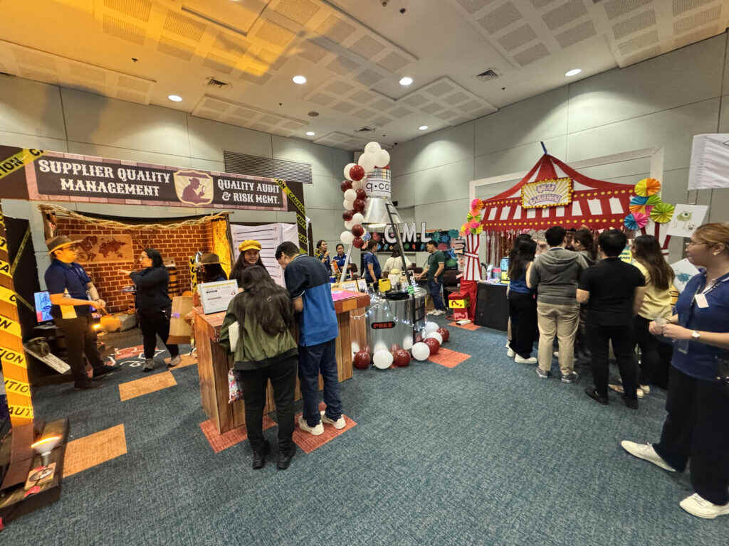 Attendees try out an interactive showcase like an escape room and hands-on demonstrations
