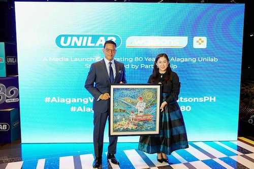 UNILAB and Watsons executives celebrate the ShareTheAlaga partnership between the two companies.